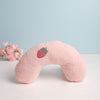 A cozy U-shaped neck pillow for pets, providing support for deep sleep and a comfy headrest.